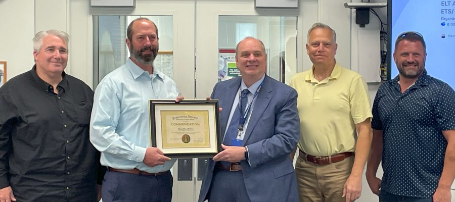 Idaho Transportation Department's Directors, District Engineer and Bonneville County Prosecutor with Shea McNama, receiving a high honor award for his assistance with a murder conviction.