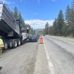 Asphalt being laid down on the newly constructed section of SH-54