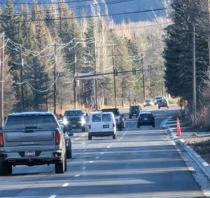 Image shows vehicles driving on SH-75
