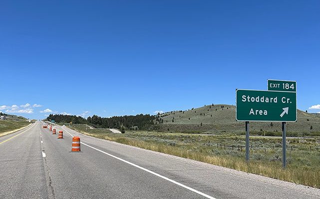 Northbound lanes and signs on I-15 at Exit 184 Stoddard Creek.