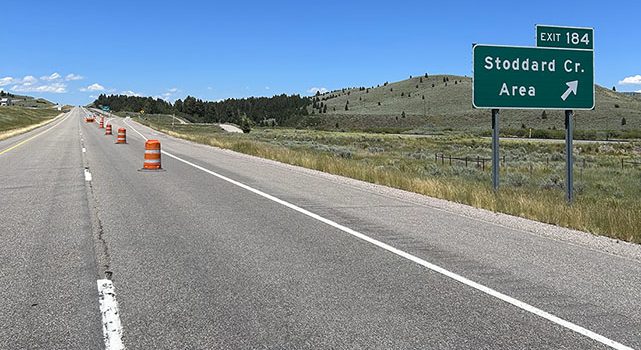 Northbound lanes and signs on I-15 at Exit 184 Stoddard Creek.