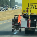 Striping truck at work on US-95.