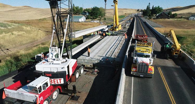 Bridge work using heavy equipment on Thorn Creek Bridge over US-95 near Lewiston, Idaho.