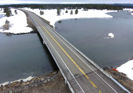 Aerial view in winter of the US-20 Osborne Bridge near Island Park, Idaho.