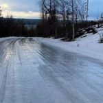 An ice -covered roadway in winter.