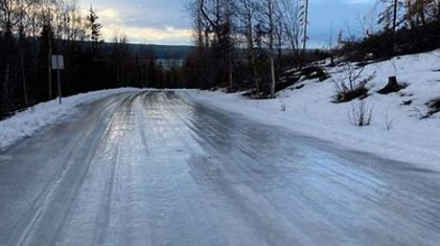 Ice-covered roadway in winter.