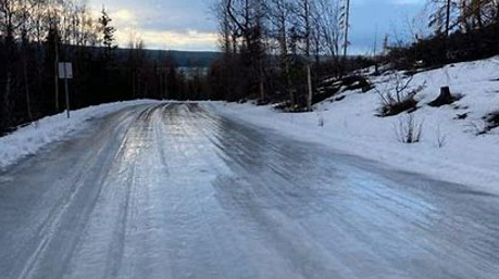 An ice -covered roadway in winter.
