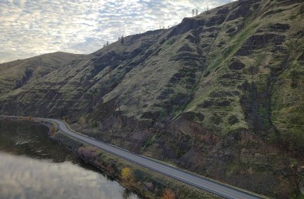 Picture taken from a drone on a cloudy day above US-12 and overlooking the rocky slope by Arrow Bridge.