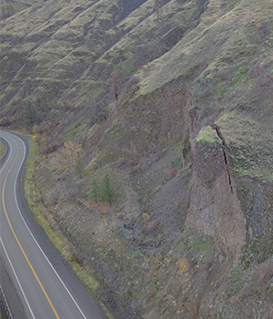 A drone photo of the slope near US-12 and Arrow Bridge prior to the emergency rock scaling project.