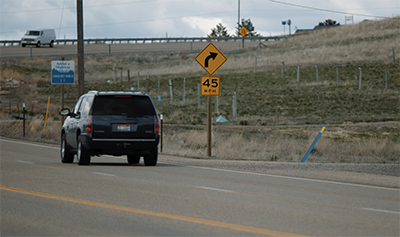 45 MPH curve sign near Hoskins Road intersection