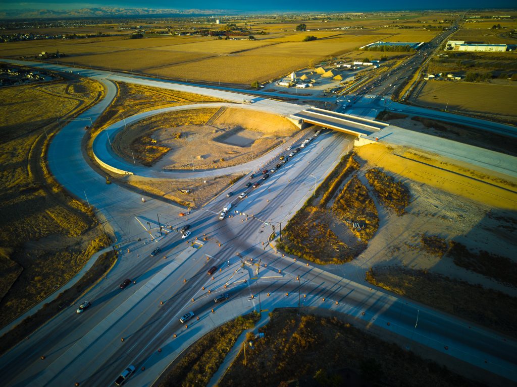 Aerial view of the SH-16/US-20/26 Interchange from October 2026