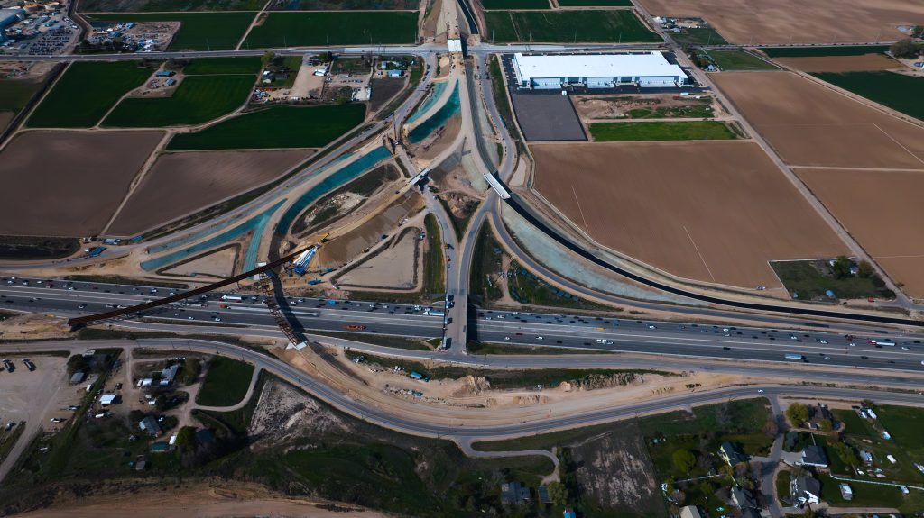 Aerial view of construction at the future I-84/SH-16 System Interchange.