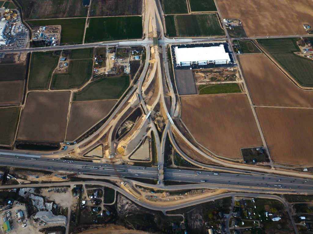 Aerial view of the I-84/SH-16 System Interchange, March 2026