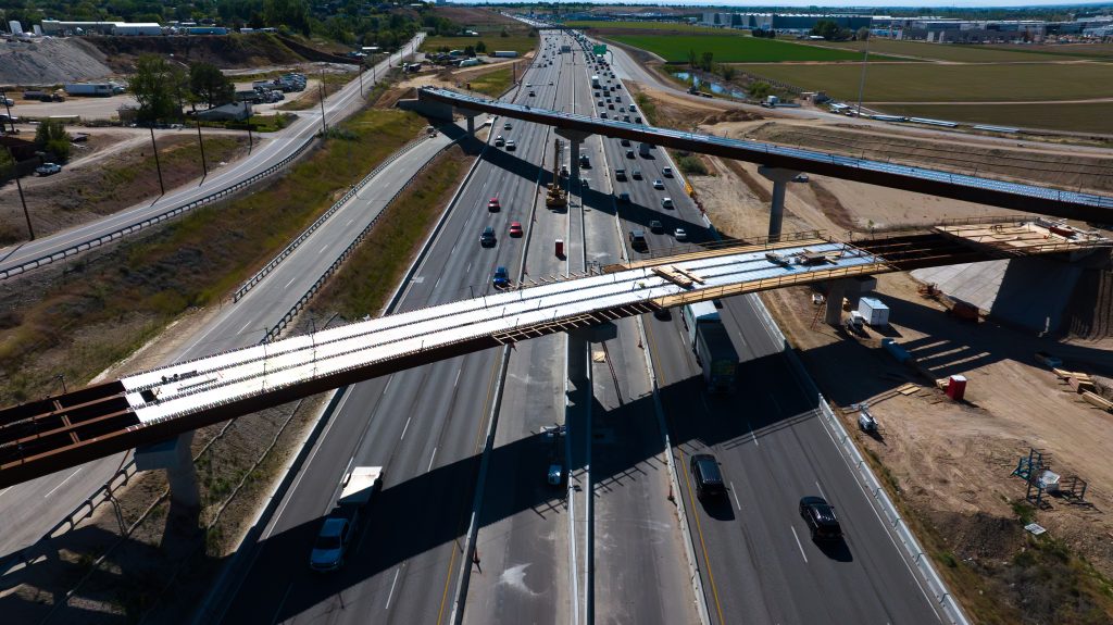 Girders over I-84 at the future I-84/SH-16 System Interchange.