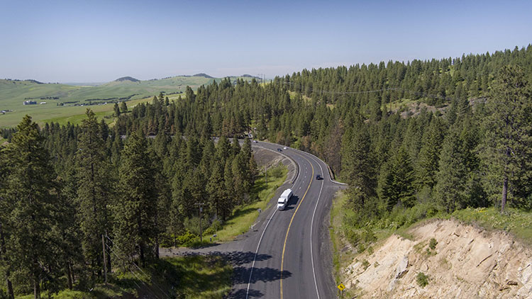 Aerial view of a mountainous curve of US-95 in Latah County, Idaho.