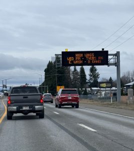 Electronic message board on US-95 in Hayden advising drivers of high winds ahead of a forecasted storm.