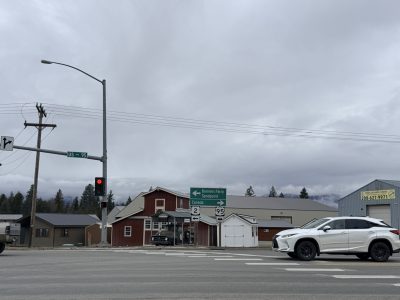 Traffic signal and roadway sign at the intersection of US-95 and US-2, commonly called '3-Mile Junction.'
