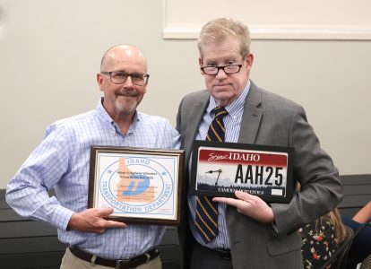Jay Buttars President of the Preston Rotary Club and D5 Board Member John Bulger.