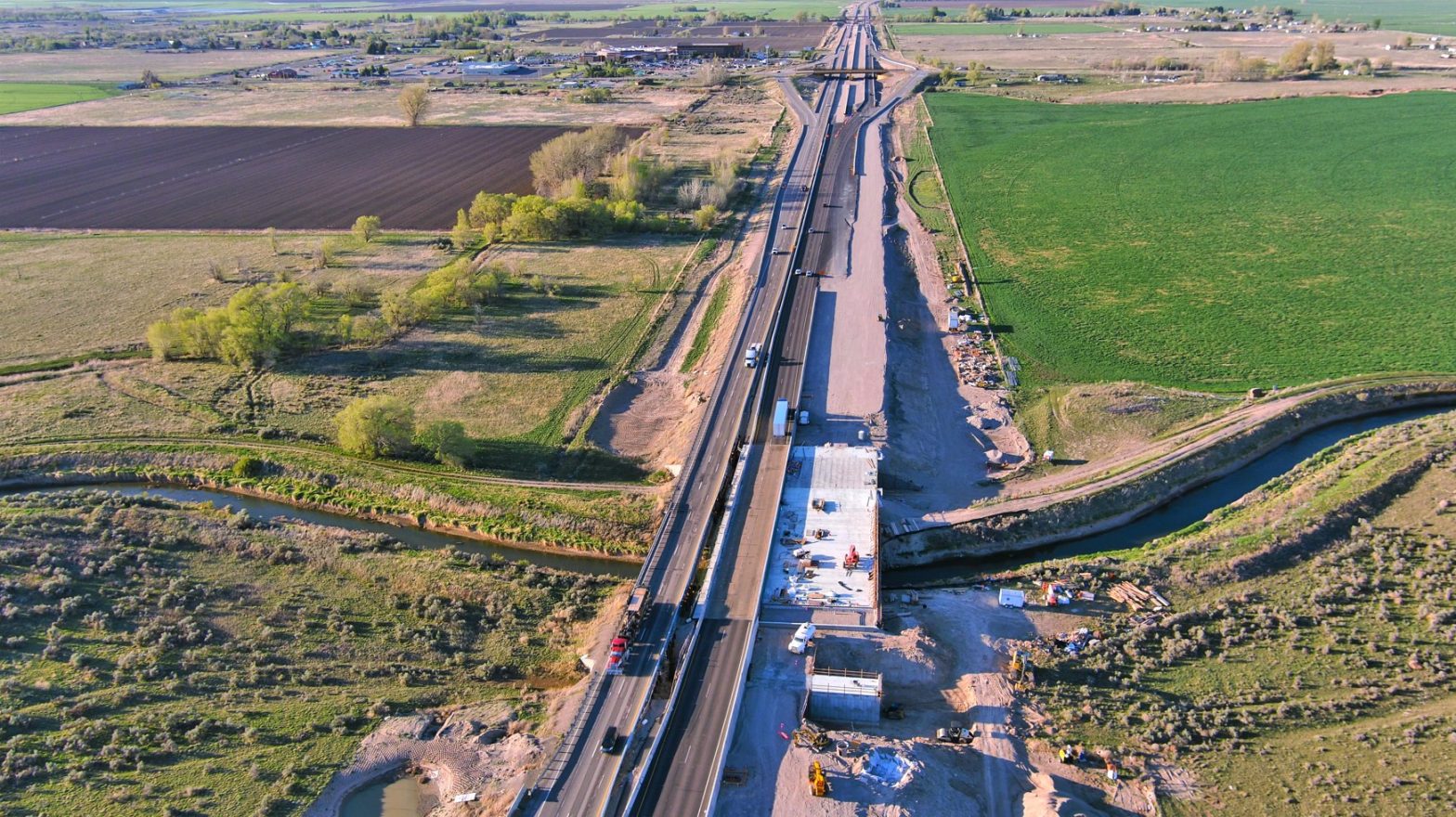 Aerial view of I-15 near Fort Hall during construction.
