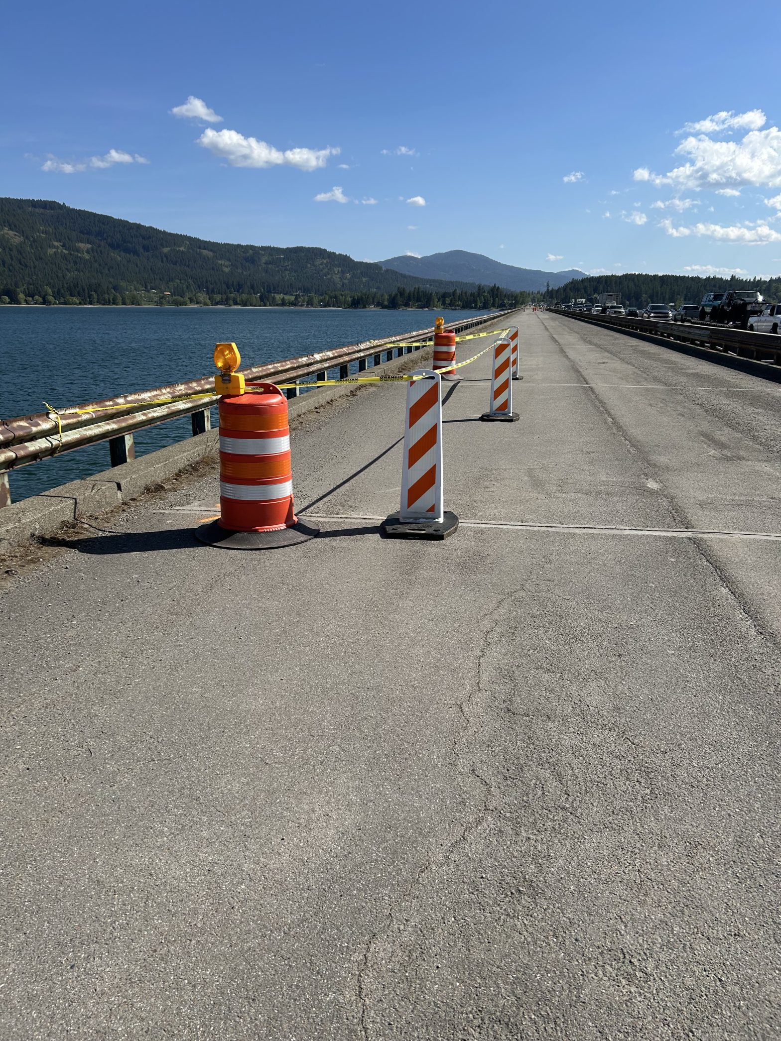 Traffic cones and caution tape being used to section off areas of the Long Bridge.
