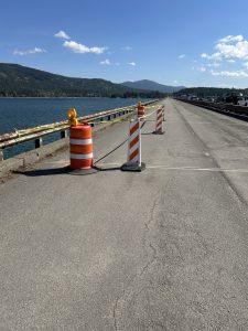 Traffic cones and caution tape being used to section off areas of the Long Bridge.