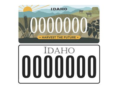 Idaho license plate graphic showing a colorful agriculture‑themed design above a simple black‑and‑white numeric plate.