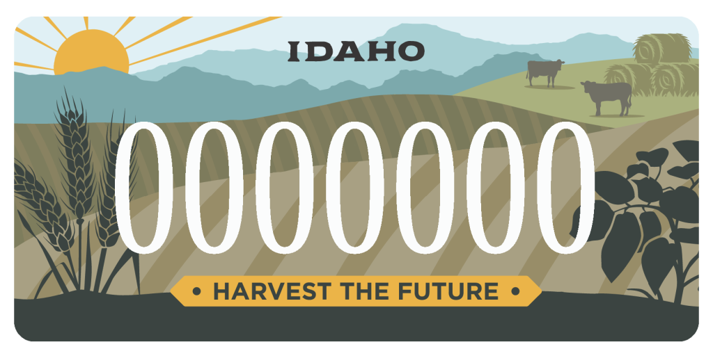 Idaho plate with sunrise, mountains, fields, cows, wheat, and potatoes, with “Harvest the Future” on a yellow banner.