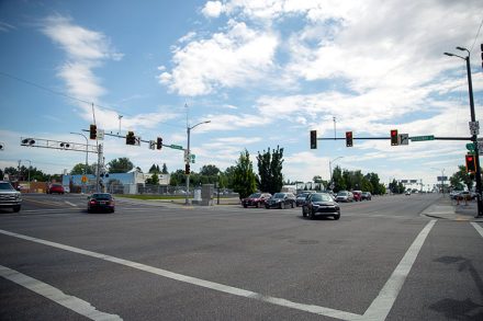 Roadway and traffic at the intersection of Broadway and US-26 (Yellowstone Highway) in the city of Idaho Falls.